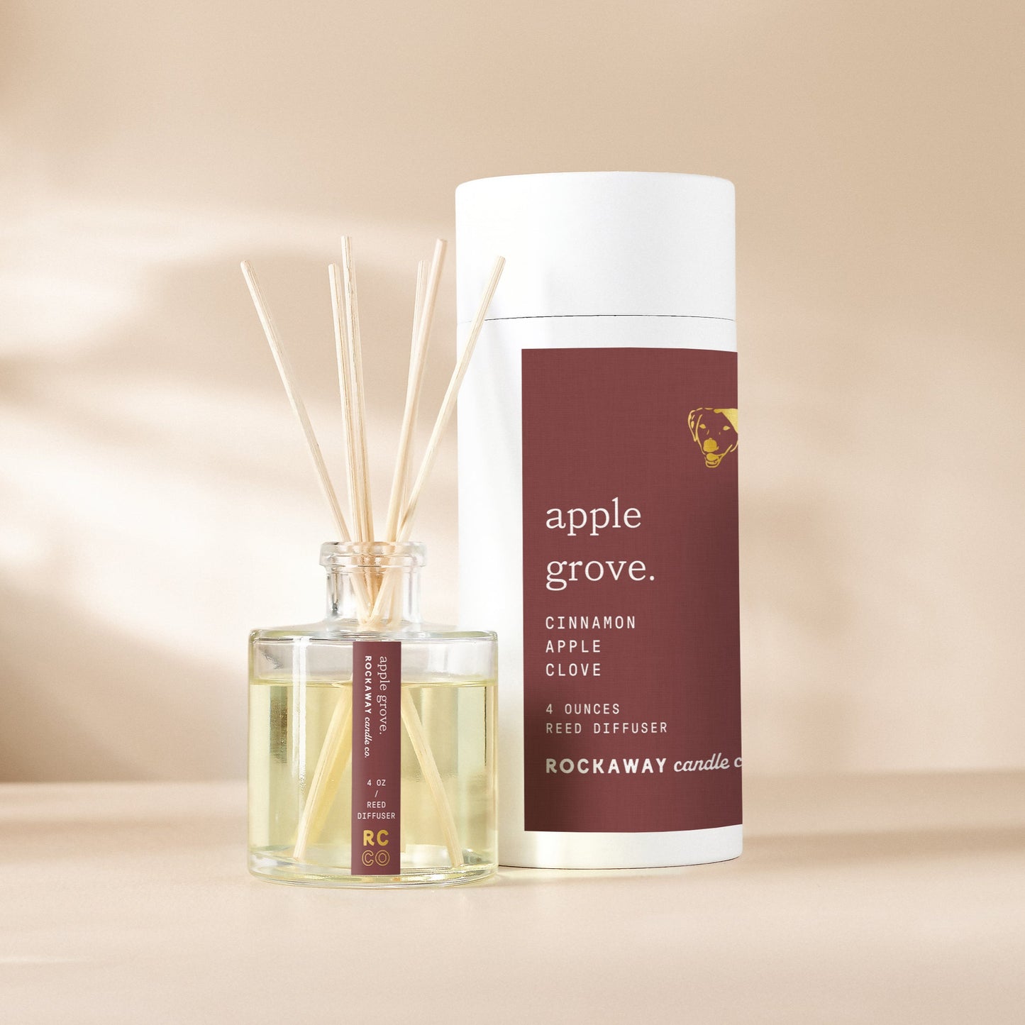 Apple Grove diffuser with reeds on a beige background